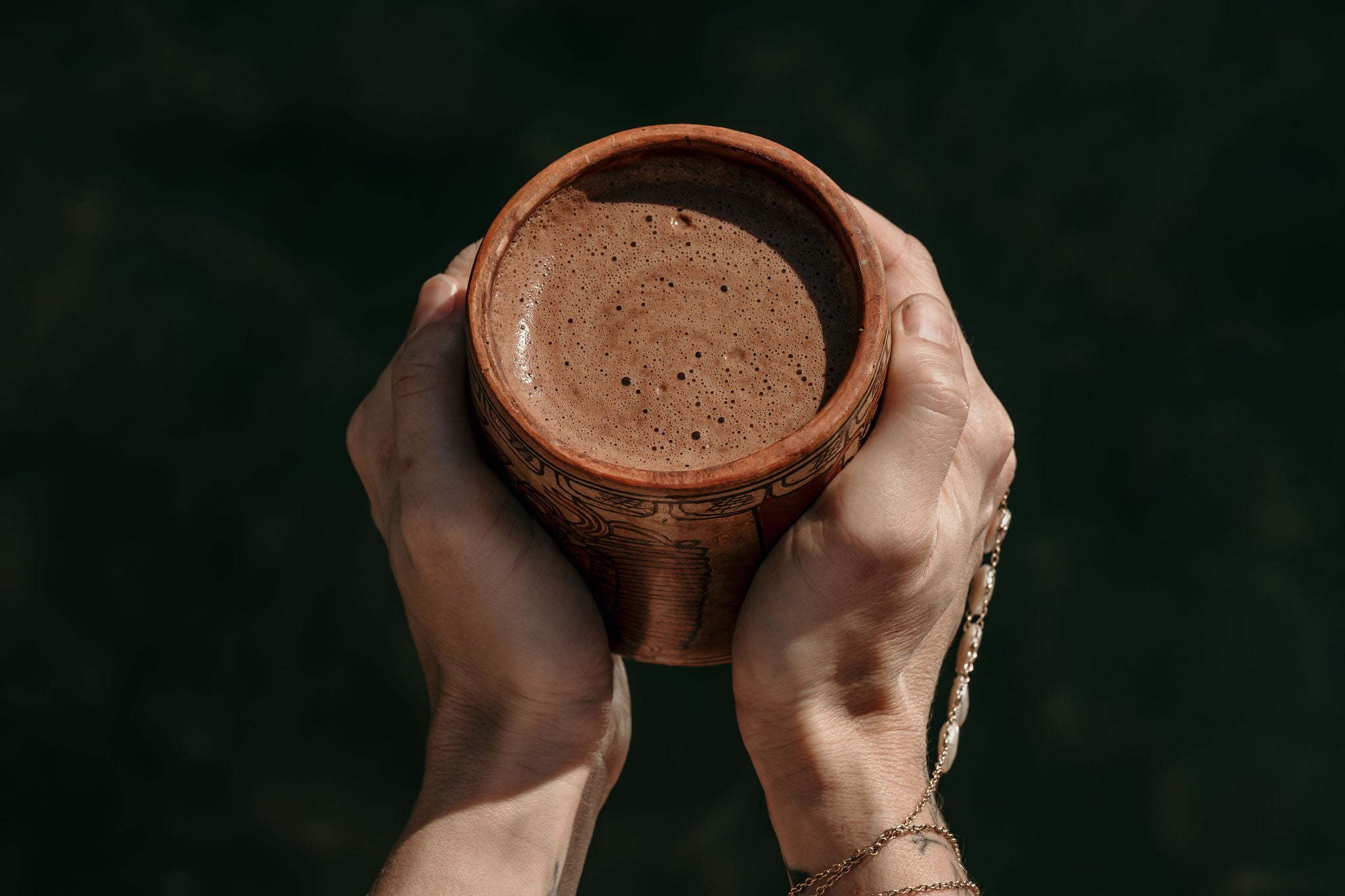 Laddy holding a Coffee Cup in her hands